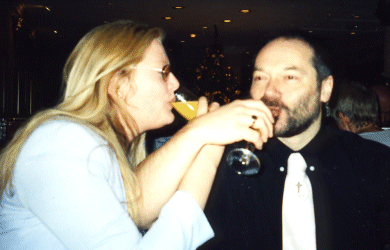 The happy couple before Paul revealed the bottom half of his tie